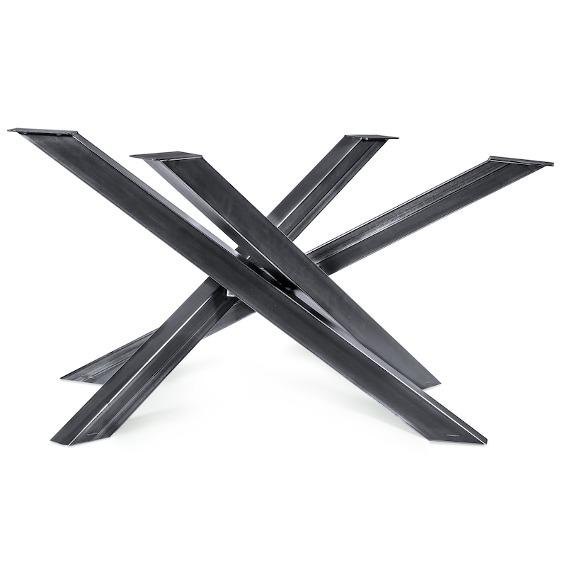 May include: A black metal table base with a unique X-shaped design. The base is made of thick, sturdy metal and has a sleek, modern look.