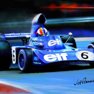 May include: A blue racing car, featuring the number 6 and the 'Elf' logo, speeding across a track. The driver wears a helmet with a colourful design. The image includes the Ford and Goodyear logos. The artist's signature is visible.