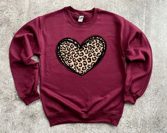 【GRAVER】heart leopard embroidery half-up clip sweatshirt Designer fashion, Seoul-fully created | W Concept