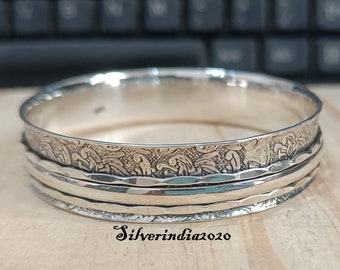 Sterling Silver Spinner Bangle: Hammered Flower Design, Stackable Jewelry