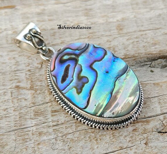 Sterling Silver Ribbon Oval Abalone Pendant Sterling Silver Ribbon Oval Abalone Pendant
