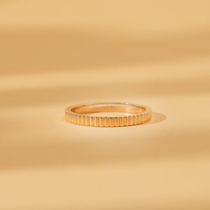 thin ribbed ring in solid gold