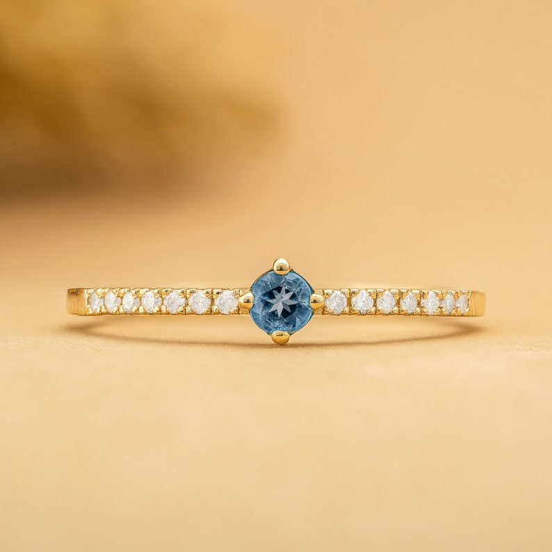 Blue Topaz and Diamond Ring