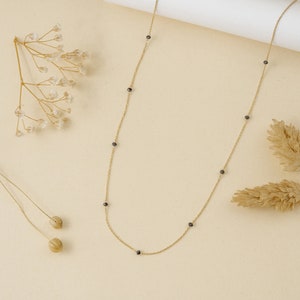 natural black diamond station necklace in 14k gold