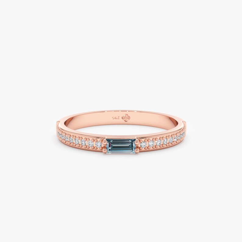 Rose Gold Blue Topaz Ring