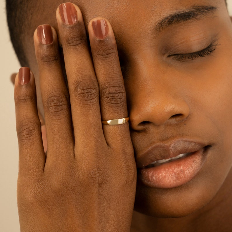 minimalistic design gold dome ring