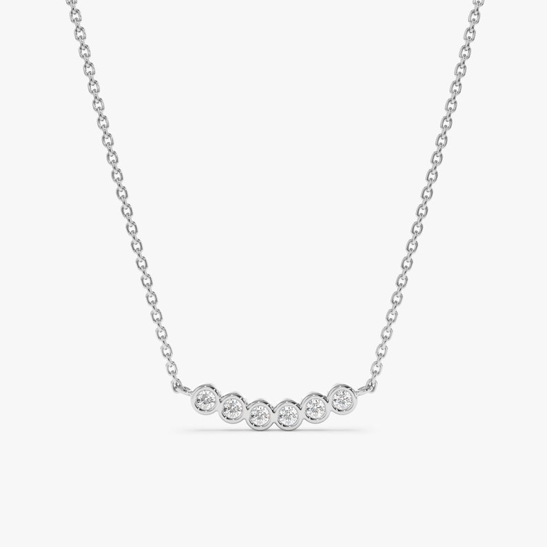 white gold curved diamond bezel bar pendant