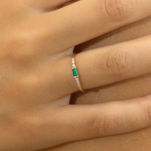 baguette emerald ring with natural round diamonds