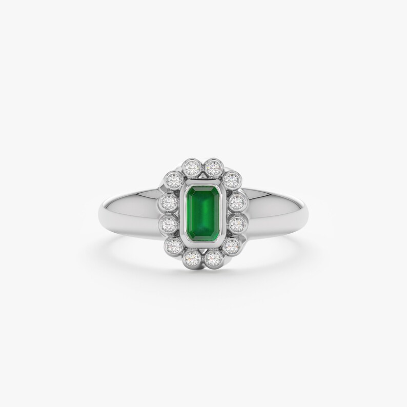 natural emerald ring with natural diamond halo in white gold