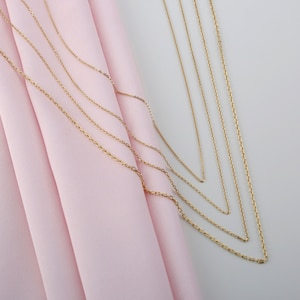 handcrafted in solid gold cable chains