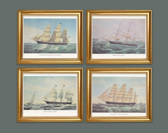 May include: Four framed prints of vintage illustrations of clipper ships. Each print features a different ship with its name below the image. The ships are depicted sailing on the open ocean.