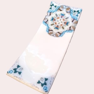 Fused glass spoon rest for kitchen. Delftware polychrome image on white glass. RedQueenArtGlass.
