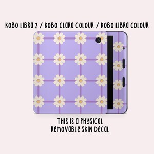 May include: A physical removable skin decal for Kobo Libra 2, Kobo Clara Colour, and Kobo Libra Colour e-readers. The decal features a light purple background with a grid of darker purple lines and a repeating pattern of white daisies with yellow centers.