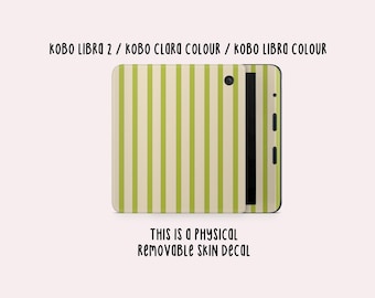 Könnte beinhalten: Ein abnehmbarer Skin-Aufkleber für Kobo Libra 2, Kobo Clara Colour und Kobo Libra Colour E-Reader. Der Aufkleber zeigt ein vertikales Streifenmuster in Hellgrün und Creme mit einem kreisförmigen Ausschnitt für die Gerätekamera.