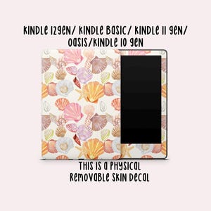 May include: A Kindle skin decal featuring a seashell pattern in shades of pink, orange, and beige. The text at the top reads "KINDLE 129EN/ KINDLE BASIC/ KINDLE 11 GEN/ OASIS/ KINDLE 10 GEN". The bottom text says "THIS IS A PHYSICAL REMOVABLE SKIN DECAL".