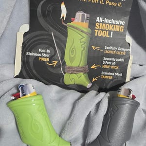 May include: Two green and gray lighter sleeves with a matching package. The green sleeve has a lighter with a flame, and the package reads "TOKER POKER" and "All-inclusive SMOKING TOOL!"