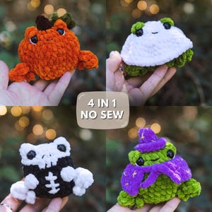 May include: A collection of four small crochet plushies featuring a pumpkin frog, a white mushroom frog, a black and white skeleton frog, and a green frog wearing a purple wizard hat and cape, with the text 4 IN 1 NO SEW centered in the middle.