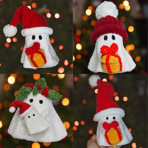 May include: Four crocheted ghost ornaments with different hats. The ghosts are white with red and white hats, a green holly wreath, and a white pom-pom. Each ghost is holding a small crocheted gift box with a red bow.
