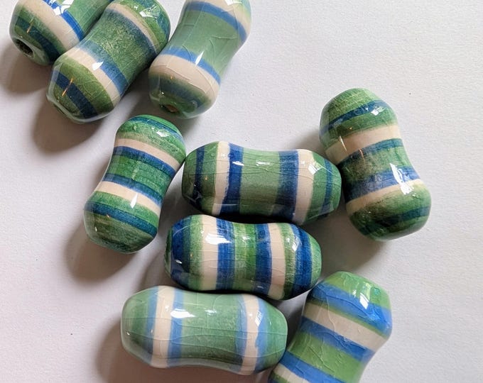 Vintage Large Ceramic Peanut Beads Green With Blue White Stripes vintage-large-ceramic-peanut-beads-green-with-blue-white-stripes