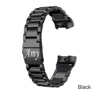 K&ouml;nnte beinhalten: Schwarzes Metallarmband f&uuml;r eine Uhr mit einer personalisierten Gravur, die "Amy" lautet.