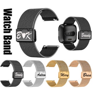 May include: A collection of watch bands in various colors, including black, silver, gold, and rose gold. Each band features a mesh design and a personalized clasp with names or initials. The text "Watch Band" is printed vertically on the left.