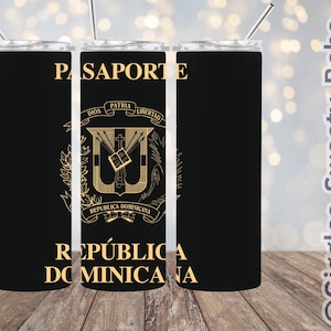 May include: Two black and gold stainless steel tumblers with a Dominican Republic passport design. The tumblers feature the words "PASAPORTE" and "REPÚBLICA DOMINICANA" in gold lettering.