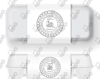 May include: A white egg carton with a black and white circular sticker featuring a farmhouse illustration and a calendar with the text "Eustamige me!"