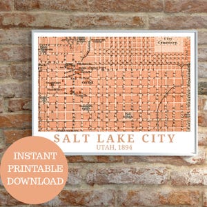May include: A vintage map of Salt Lake City, Utah, printed in 1894. The map shows the city's streets and buildings, including the Temple, City Hall, and Post Office. The map is printed in a peach colour with black text.