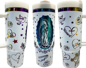 May include: Three white stainless steel travel mugs with a rainbow iridescent finish. Each mug features a different design with religious imagery, including a dove, a cross, a heart, roses, stars, and the words "Faith", "Love", "Hope", "Blessed", and "Jesus".