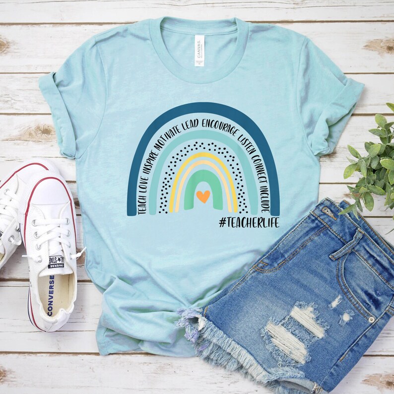 Rainbow Teacher T-Shirt Teach Love Inspire Motivate Lead Bella Light Blue