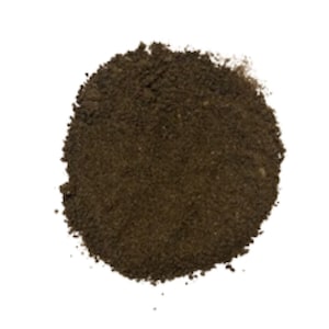 May include: A close-up of a pile of dark brown ground coffee beans.