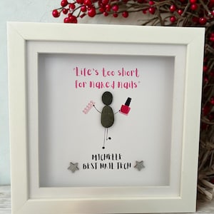 May include: Framed artwork with a white border. The artwork features a stick figure holding nail polish and a nail file, with the text "Life's too short for naked nails." Below the figure is the text "MICHELLE BEST NAIL TECH."