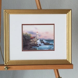 4 Thomas Kinkade Lighthouse prints  &quot;Beacon of Hope&quot; &quot;The Light of Peace&quot; &quot;Clearing Storms&quot; &quot;A Light in the Storm&quot; (landscape, ocean side)