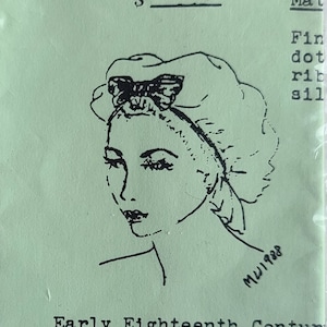 Puede incluir: Una ilustración en blanco y negro de una mujer con un gorro con un diseño de mariposa. El texto "Emanjay Patterns No. HR-602 S" está impreso encima de la ilustración. El texto "Early Eighteenth Century" está impreso debajo de la ilustración. El texto "Mat Fin dot rib sil" está impreso a la derecha de la ilustración.