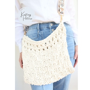 May include: Cream-colored, hand-knitted shoulder bag with a decorative openwork pattern. The bag has a patterned strap and gold-colored hardware. The text "Knitting Pattern" is visible in the upper left corner.