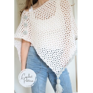 May include: A cream-colored crochet poncho with a textured open weave design. The poncho features three decorative gray buttons on the shoulder and a gray tassel. The bottom edge has a gray border. The image includes the text "Crochet Pattern".