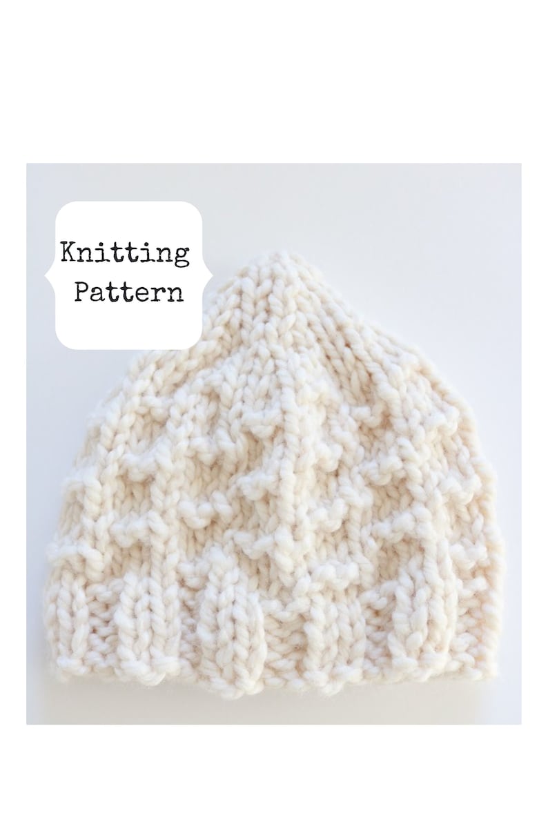 May include: A white knitted hat with a textured pattern. Knitting Pattern.