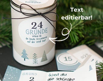 May include: A white metal tin with a brown lid and a black ribbon tied around it. The tin has a label that says "24 Gründe" and "Wieso du die beste Erzieherin auf der Welt bist!" The tin is surrounded by green foliage. Text on the image reads "Text editierbar!"