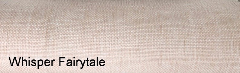 May include: A close-up of a beige fabric with a subtle woven texture. The text "Whisper Fairytale" is printed in black at the bottom of the image.
