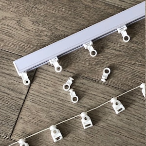 Add Finished Ripple Fold Track System to your curtains