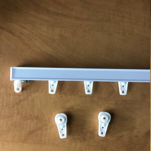 Hardware for Pleated Curtains, Tracks for Pleated sheers and drapery panels. White Color.