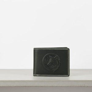 Embossed Wolf Bi-Fold Wallet: Oil Pull Up Leather, RFID Protection