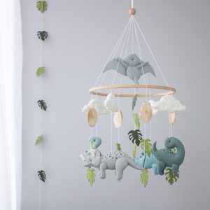 Dinosaur baby mobile. Jurassic nursery decor. Dinosaur theme baby shower. Newborn gifts idea. Woodland nursery decor. Felt hanging mobile