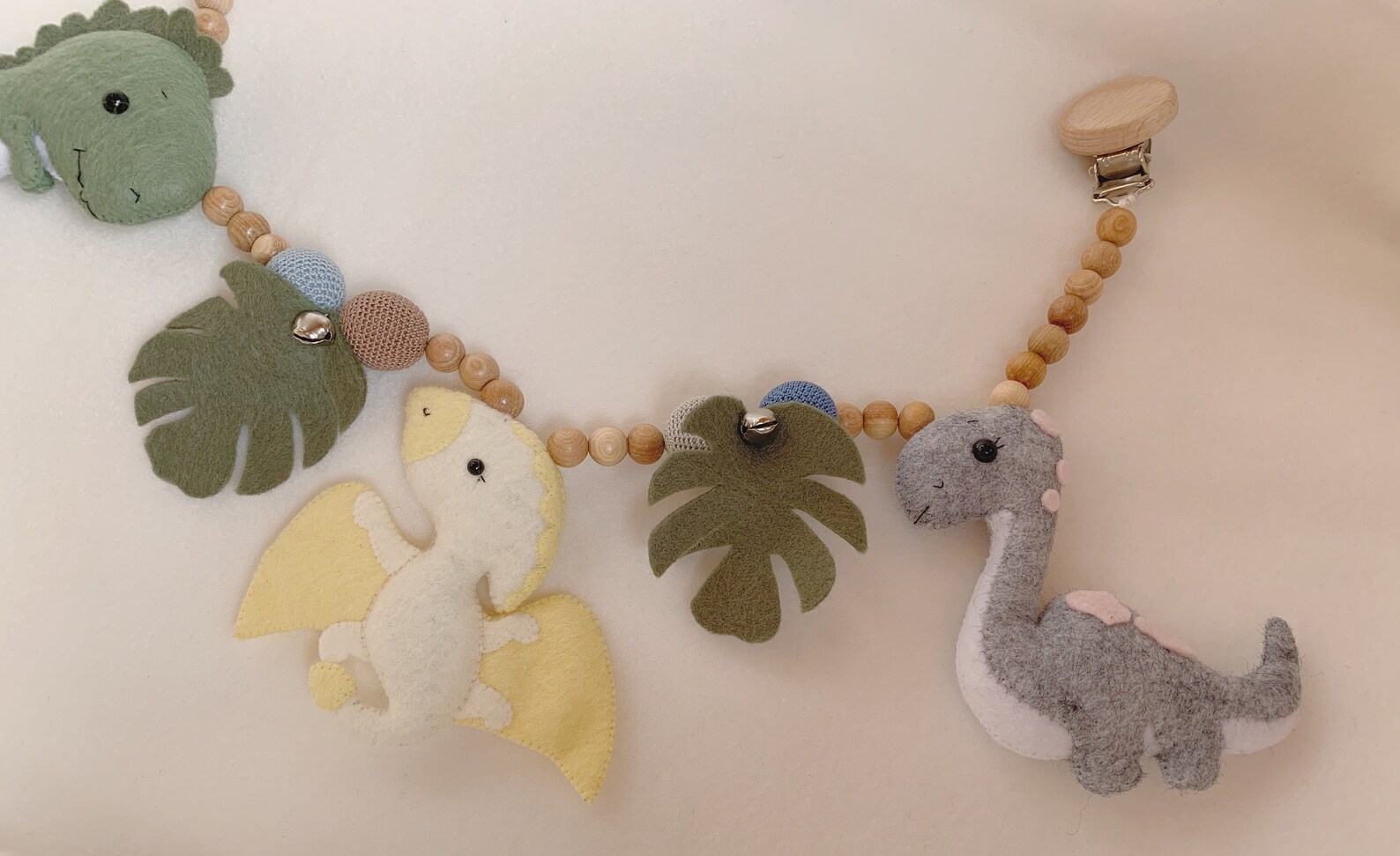 Dinosaur pram garlandHanging stroller toysGender neutral Etsy