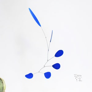 Mobile kinetic sculpture. Wind mobile to hang. Kinetic art, blue, various colors. Recycled art