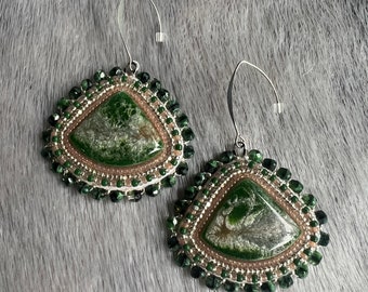 Beaded green triangle drops with silver polished beads backed on smoked moose hide