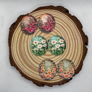 pair of painting-style floral cabs