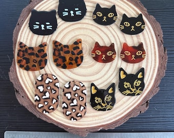 pair of CAT cabochons acrylic resin for indigenous beading projects