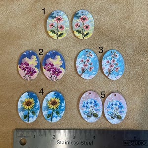 pair of floral cabochons