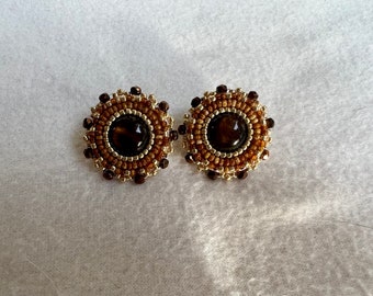 Beaded studs backed with smoked moose hide